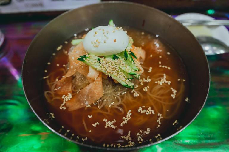 A bowl of cold buckwheat noodles in chilled broth