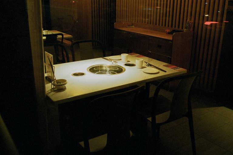 Restaurant grill table set for dining